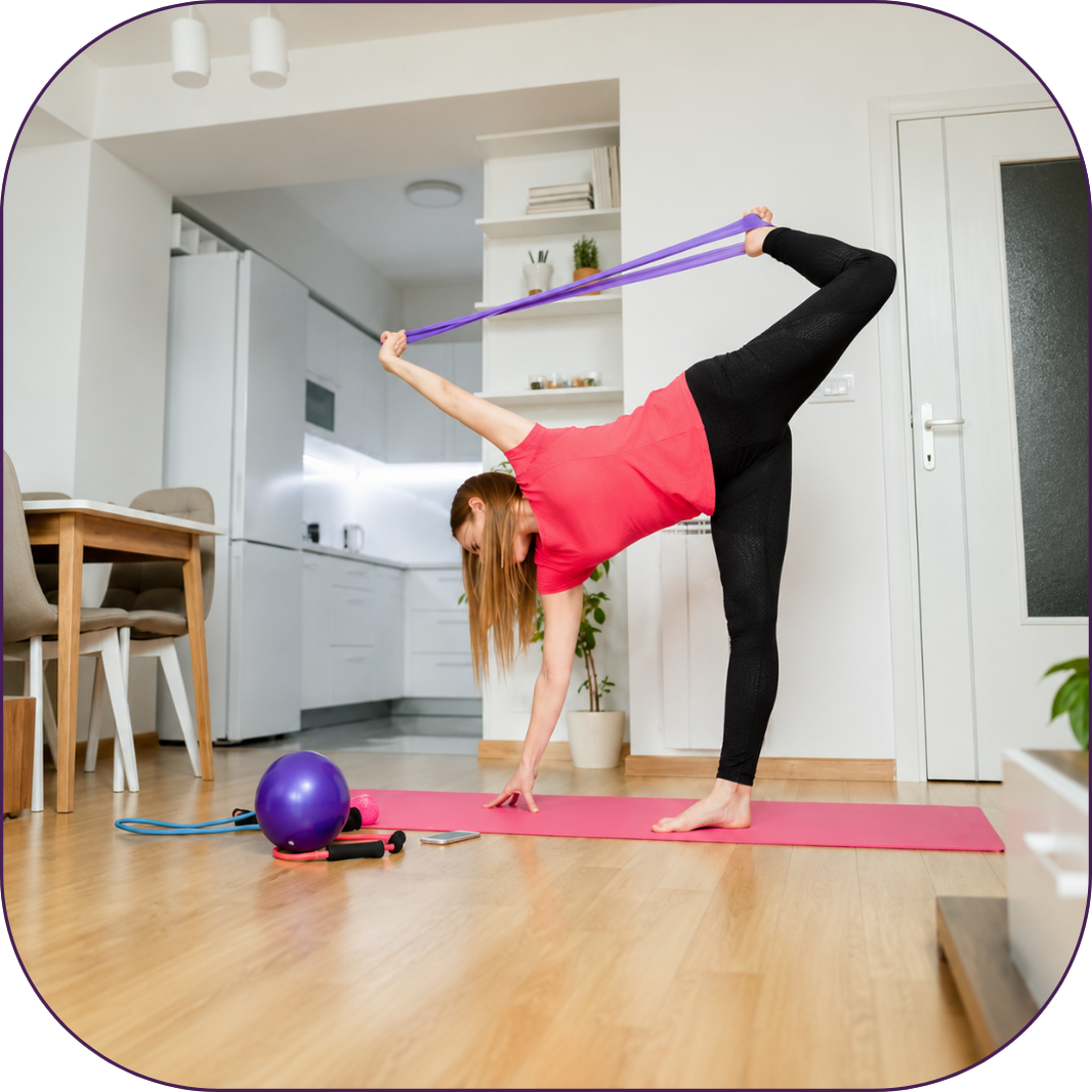 Woman exercising with resistance bands in a home setting